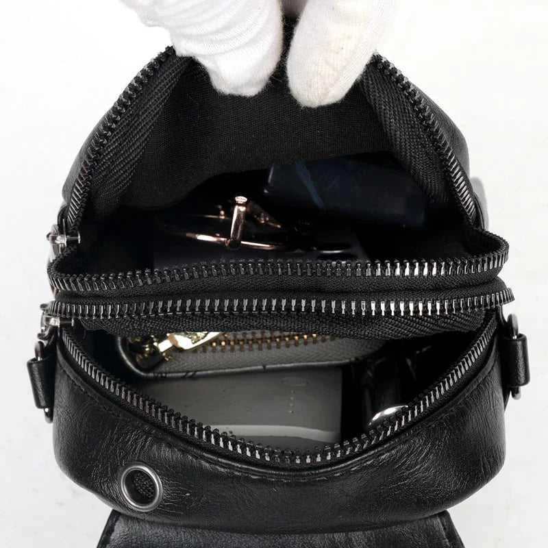 Mini sac bandoulière femme en cuir noir intérieur