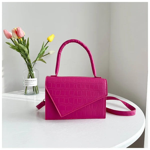 Petit sac bandoulière à rabat en cuir rose