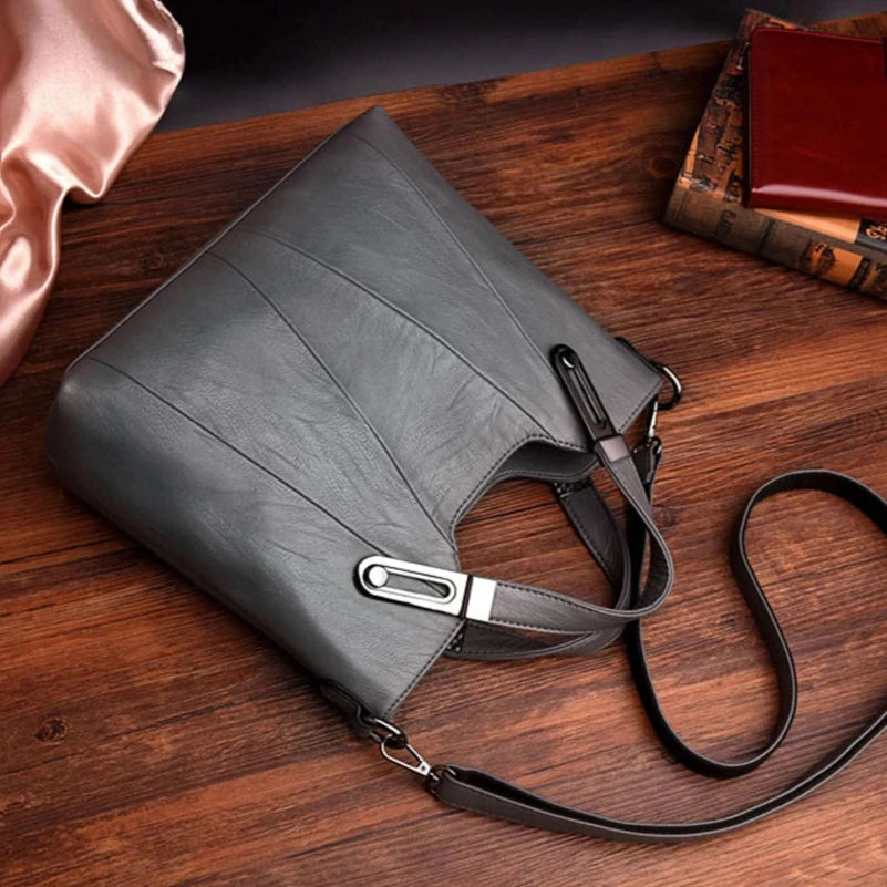 Sac à main avec anse et bandoulière gris à plat