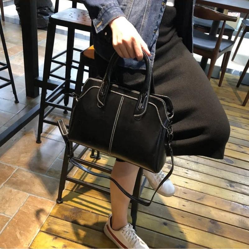 Sac à main bandoulière cuir noir femme