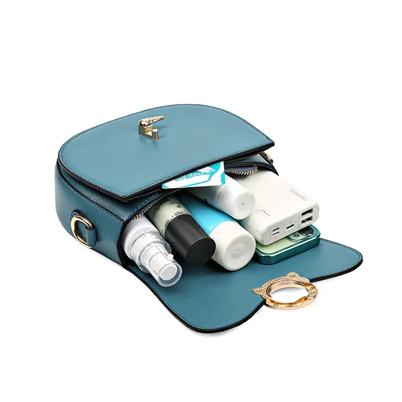 Sac bandoulière besace femme bleu rempli