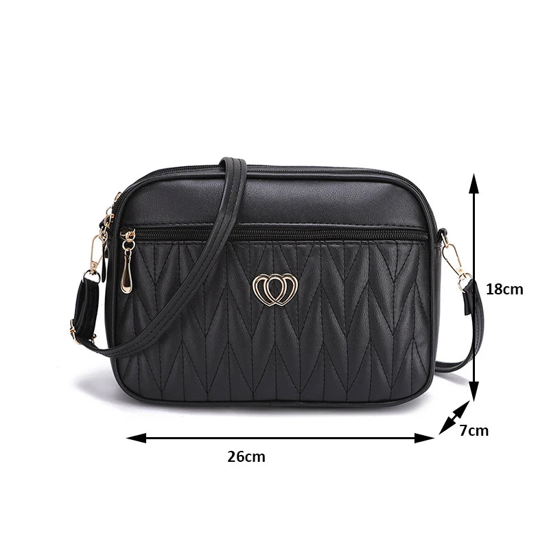 Sac bandoulière compact en cuir synthétique noir dimensions