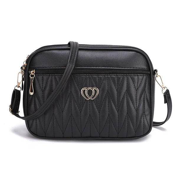 Sac bandoulière compact en cuir noir pour femme