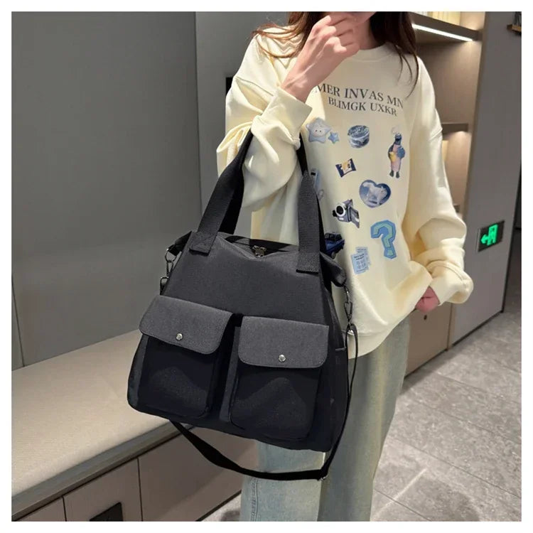 Sac bandoulière pour les cours noir femme