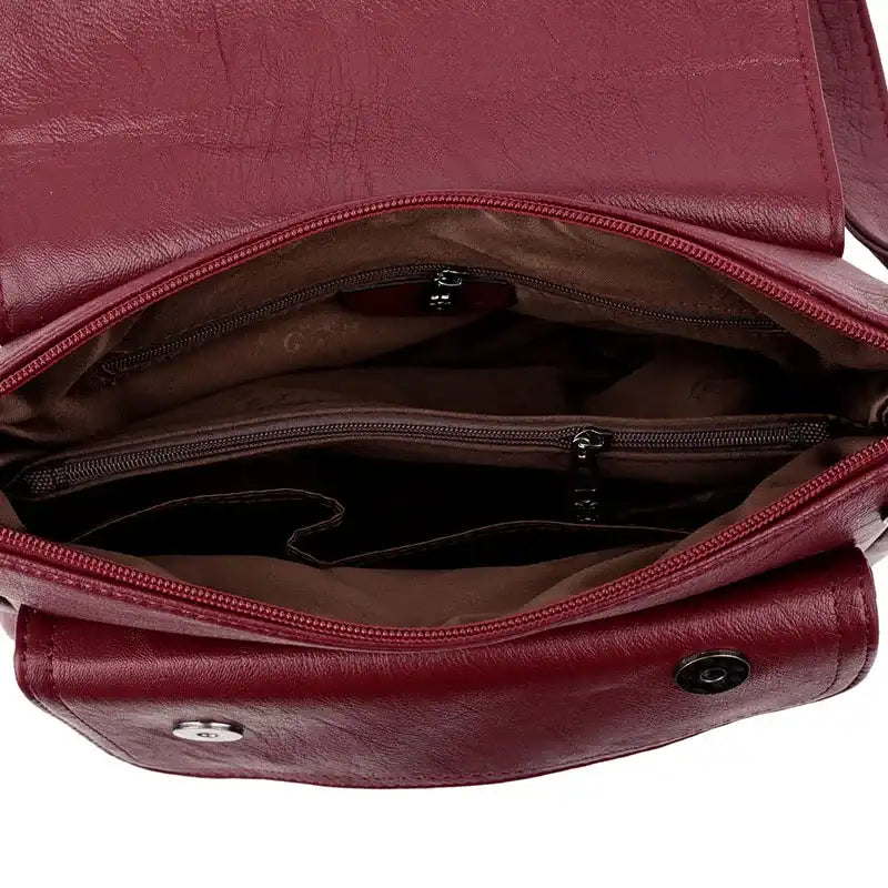 Sac bandoulière en cuir souple pour femme bordeaux intérieur
