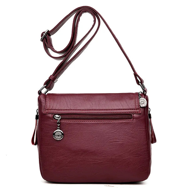 Sac bandoulière en cuir souple pour femme bordeaux poche zippée