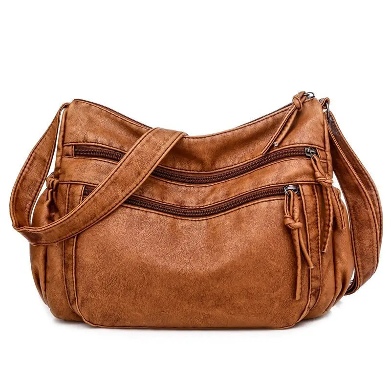 Sac bandoulière femme en cuir grandes poches