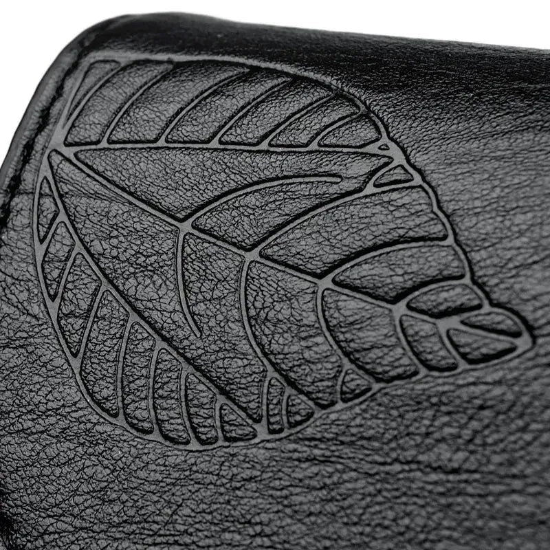 Sac bandoulière femme cuir noir détails motif feuille