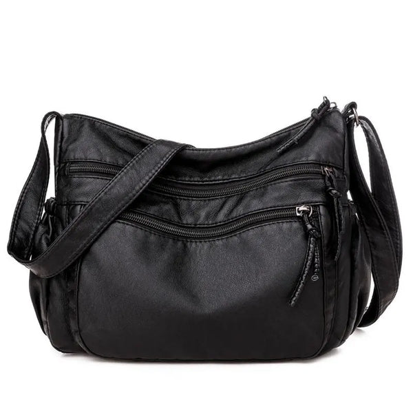 Sac bandoulière femme en cuir noir grandes poches