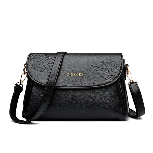 Sac bandoulière femme cuir noir motif feuille