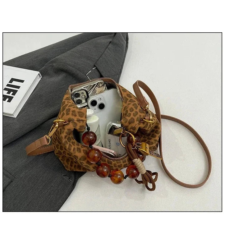 Sac bandoulière grosses perles léopard intérieur