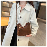 Sac bandoulière grosses perles marron en travers