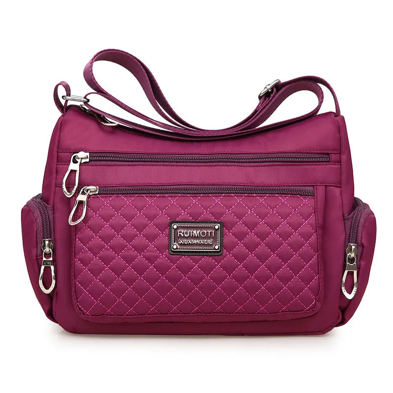 Sac bandoulière multi poches violet