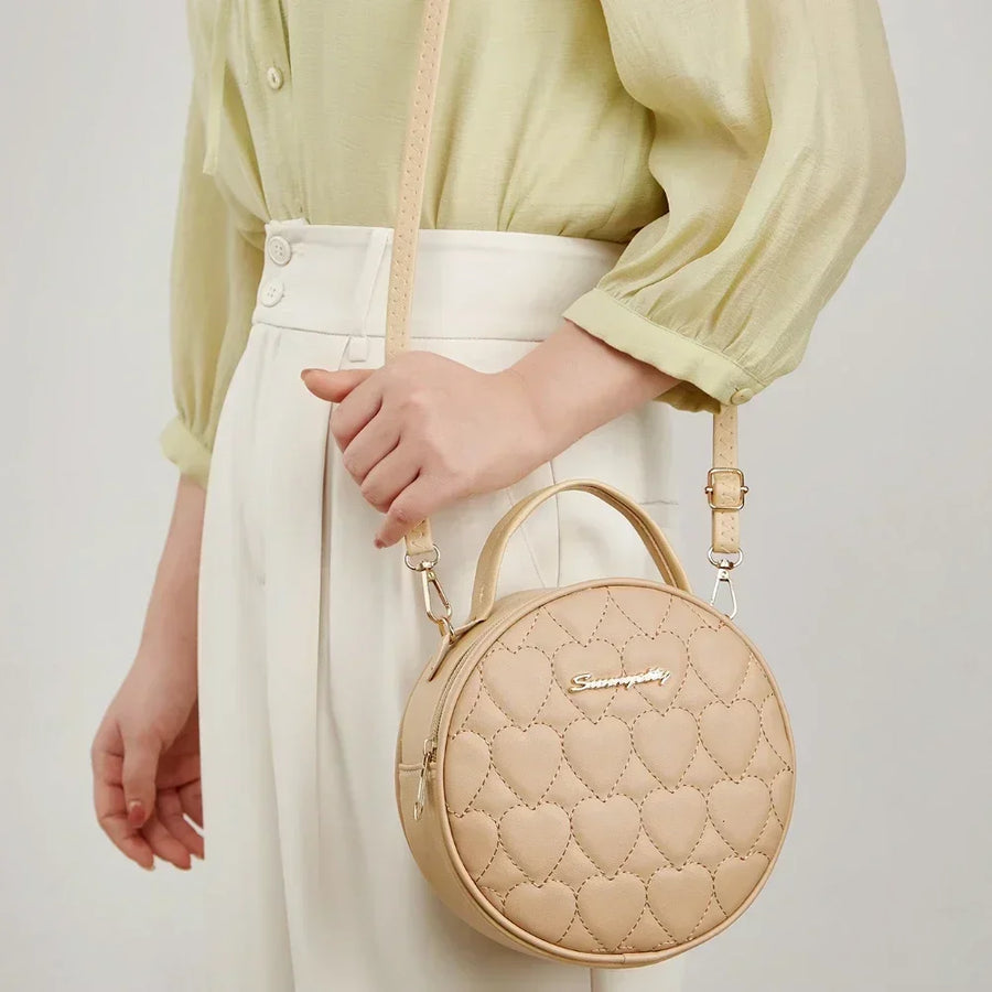 Sac bandoulière rond femme