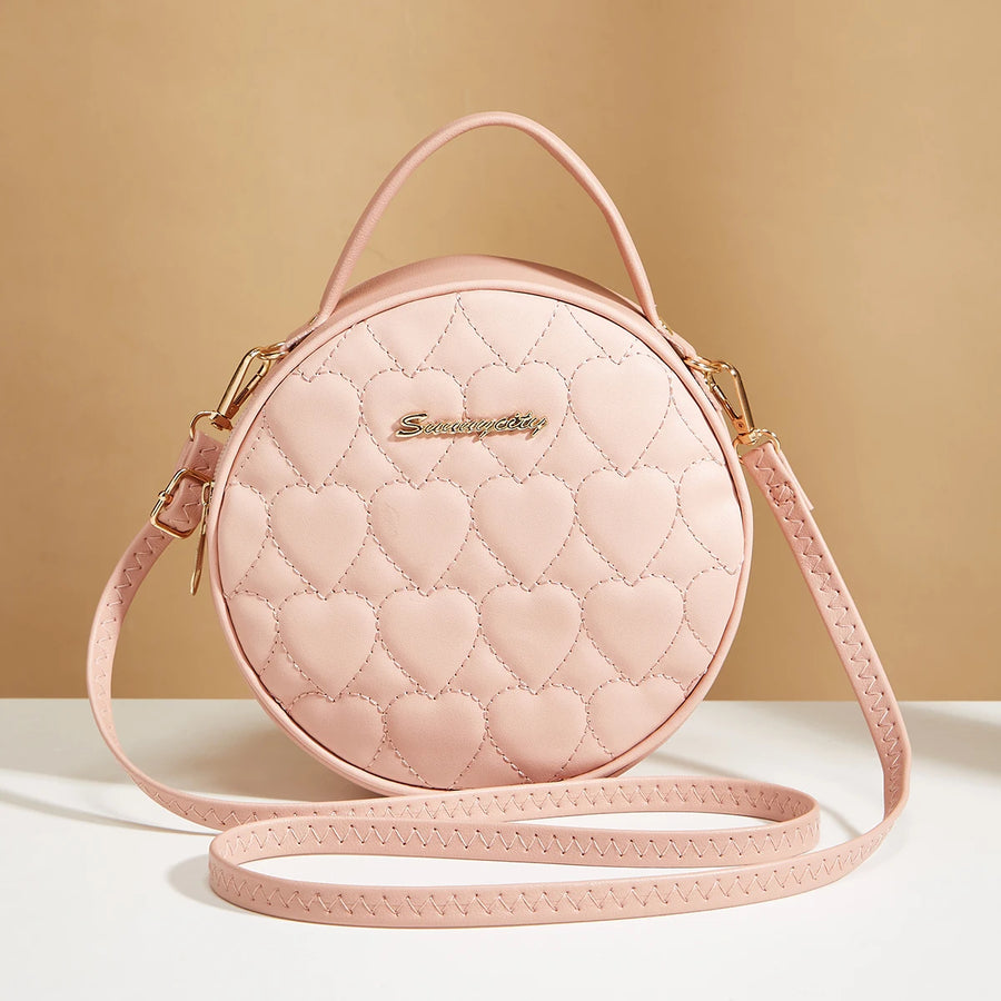 Sac bandoulière rond rose