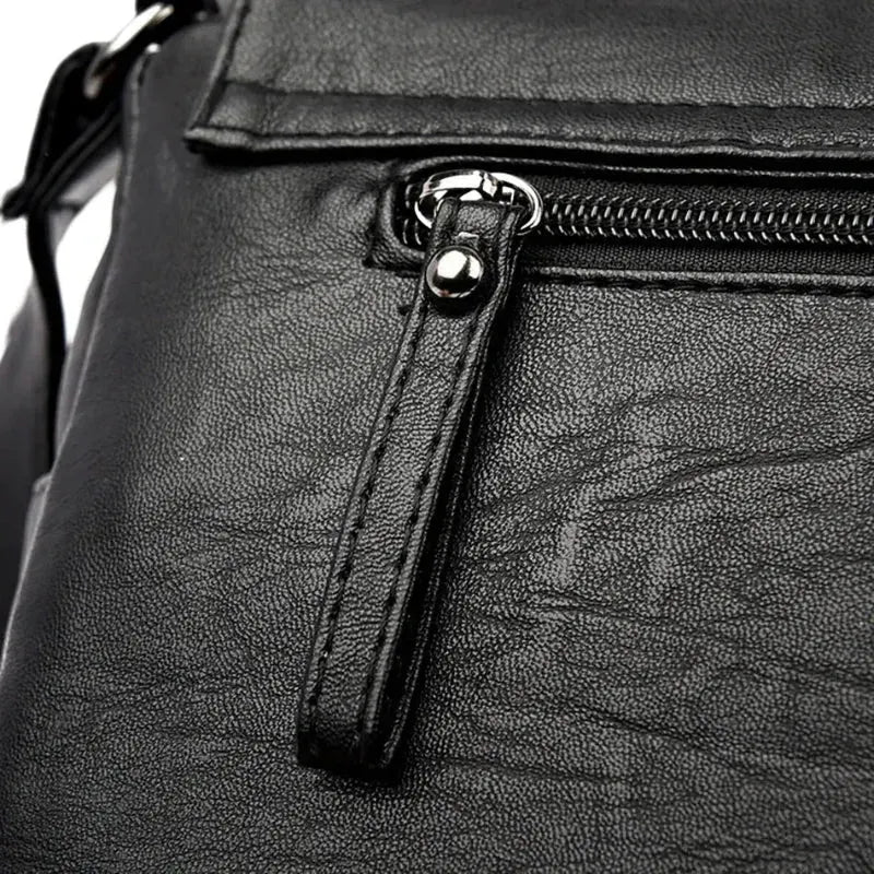 Sac besace en cuir pour femme noir détails zip