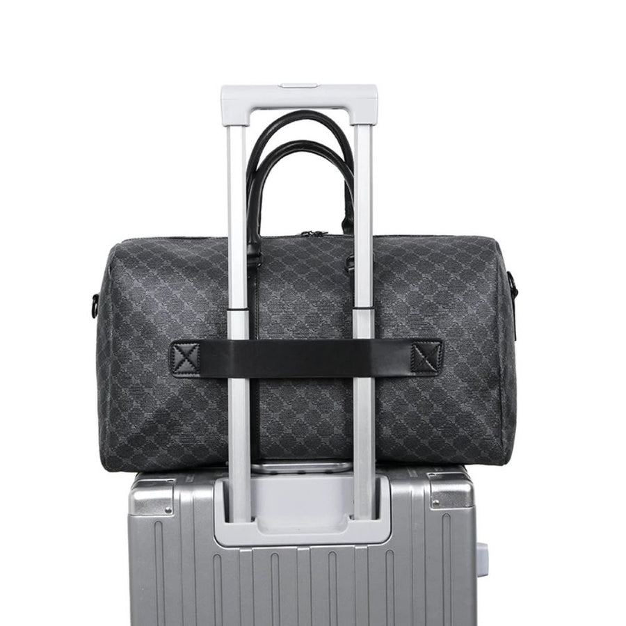Sac de voyage mixte en similicuir sur valise trolley