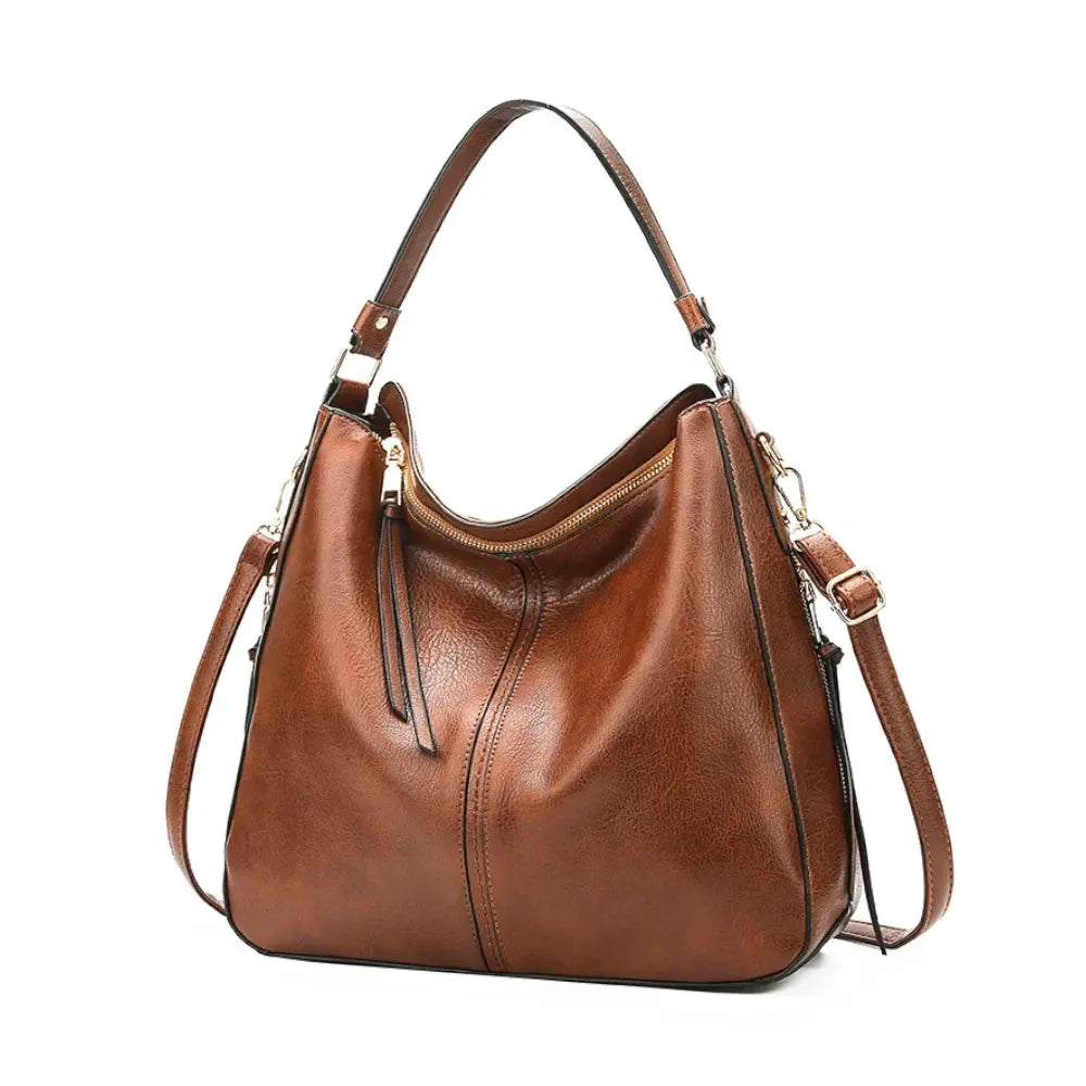 Grand sac bandoulière pour femme en cuir marron de trois quarts