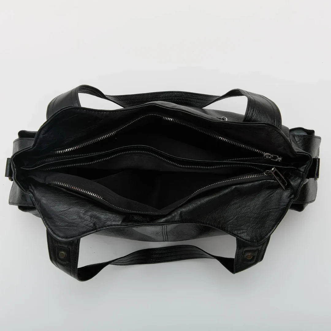 Vue du dessus des compartiments du grand sac à main noir
