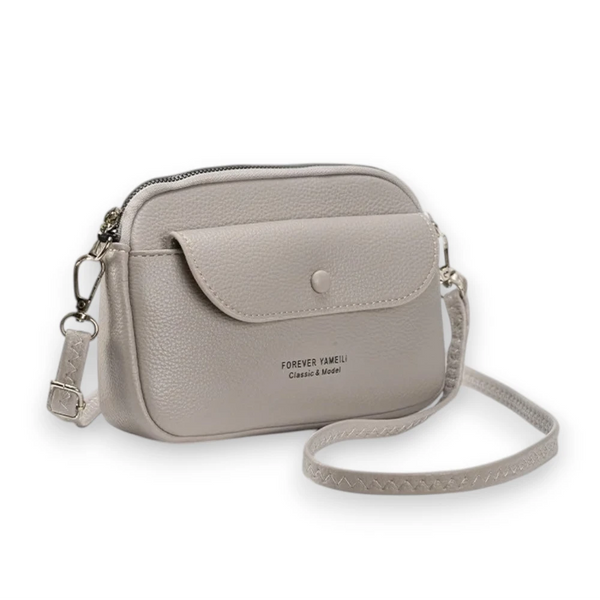 Petit sac en cuir bandoulière pour femme de trois quarts