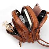 Petite sacoche bandoulière femme interieur rempli