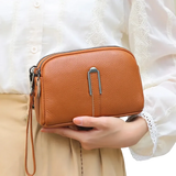 Pochette bandoulière femme en cuir marron à la main