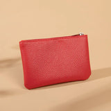 Porte monnaie en cuir rouge
