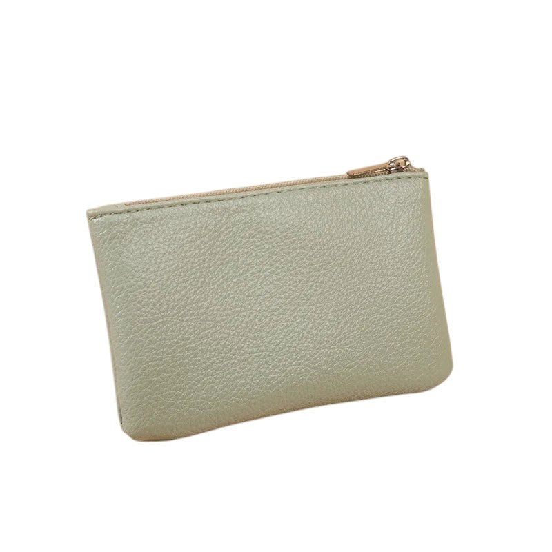 Porte monnaie en cuir vert