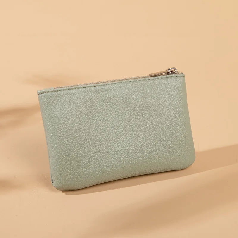 Porte monnaie en cuir vert