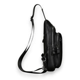 Sac à dos bandoulière en cuir noir de côté