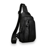 Sac à dos bandoulière en cuir noir de trois quarts