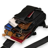 Sac à dos bandoulière en cuir noir rempli