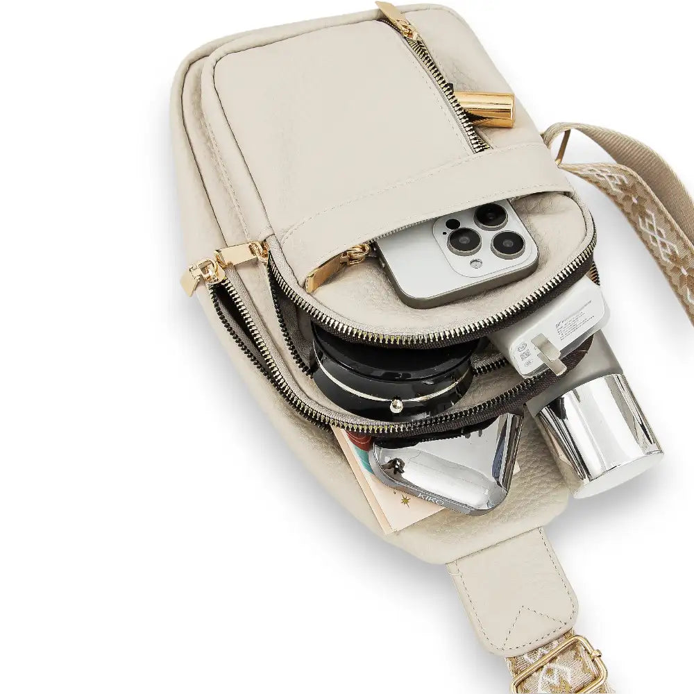 Sac à dos bandoulière femme blanc rempli