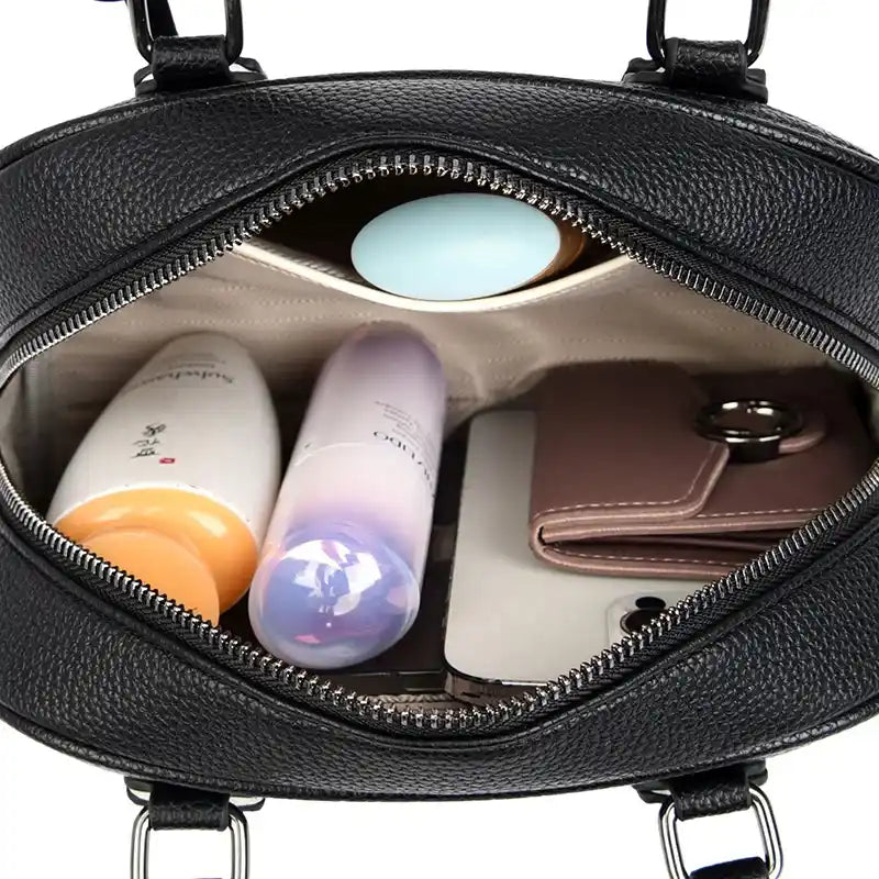 Sac à main poignées et bandoulière rempli