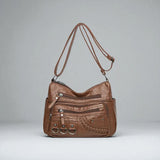 Sac bandoulière cuir souple multiples poches marron de face