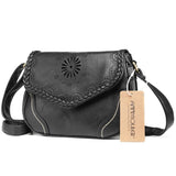 Sac bandoulière cuir vintage femme noir de trois quarts