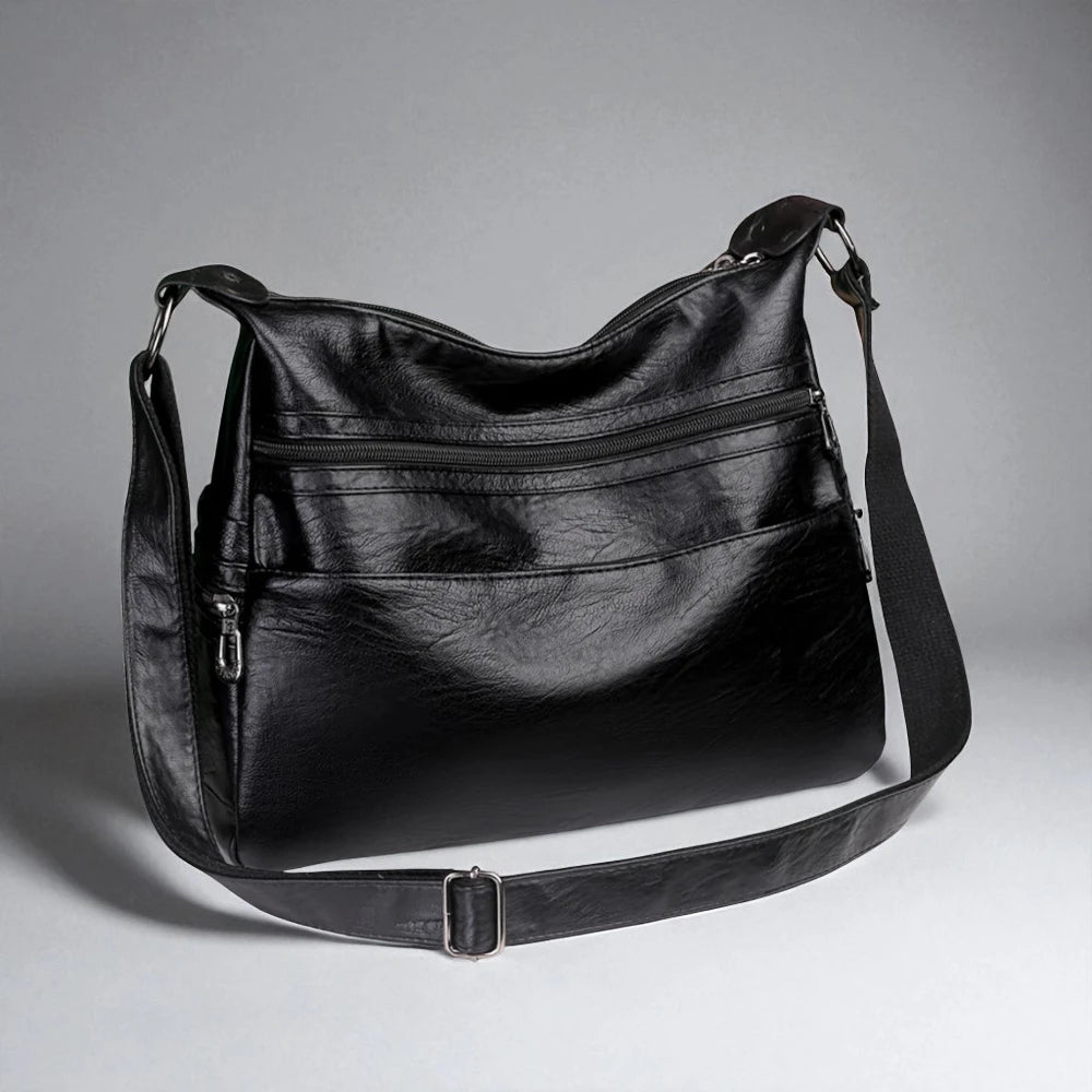 Sac bandoulière en cuir pour femme noir photo