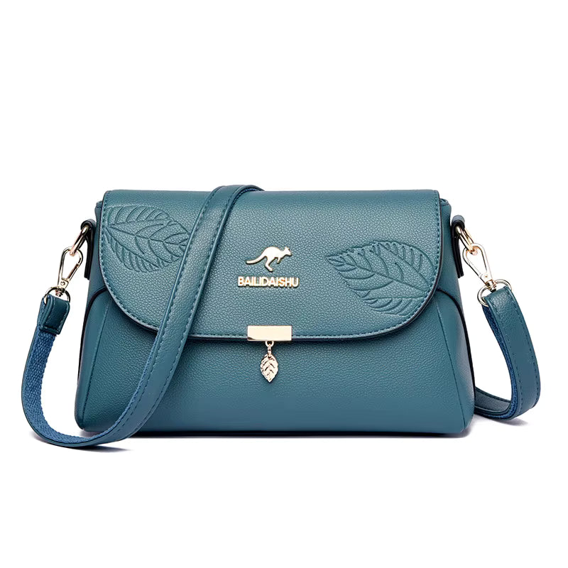Sac bandoulière femme cuir bleu motif feuille