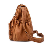 Sac bandoulière femme en cuir camel grandes poches, vue de côté