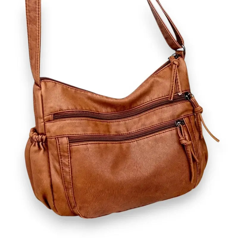 Sac bandoulière femme en cuir grandes poches