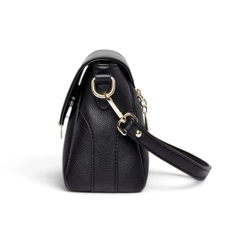 Sac bandoulière femme cuir noir motif feuille, vue de côté