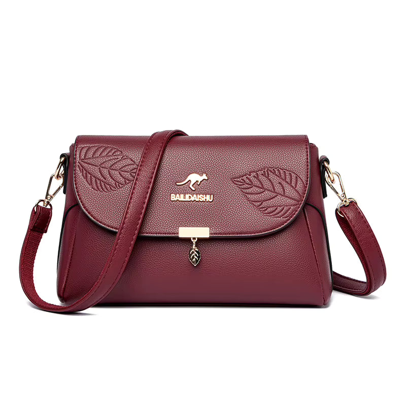 Sac bandoulière femme cuir rouge motif feuille