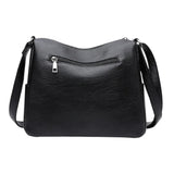 Sac bandoulière femme en cuir souple noir poche arrière