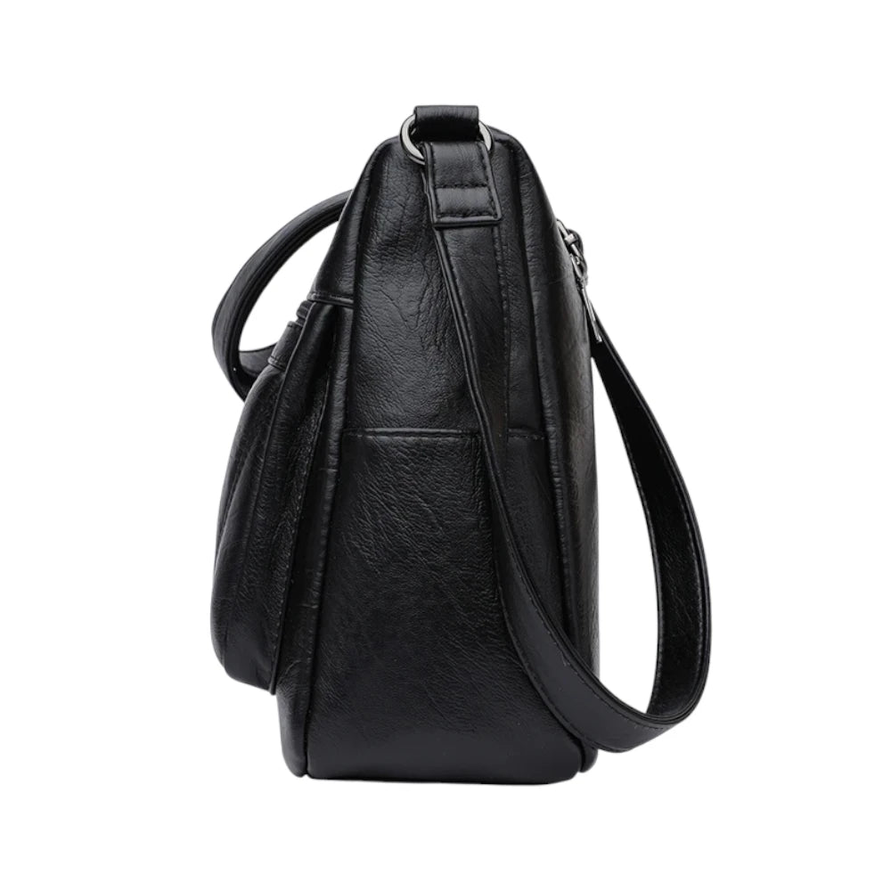 Sac bandoulière femme en cuir souple noir de côté