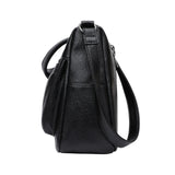 Sac bandoulière femme en cuir souple noir de côté