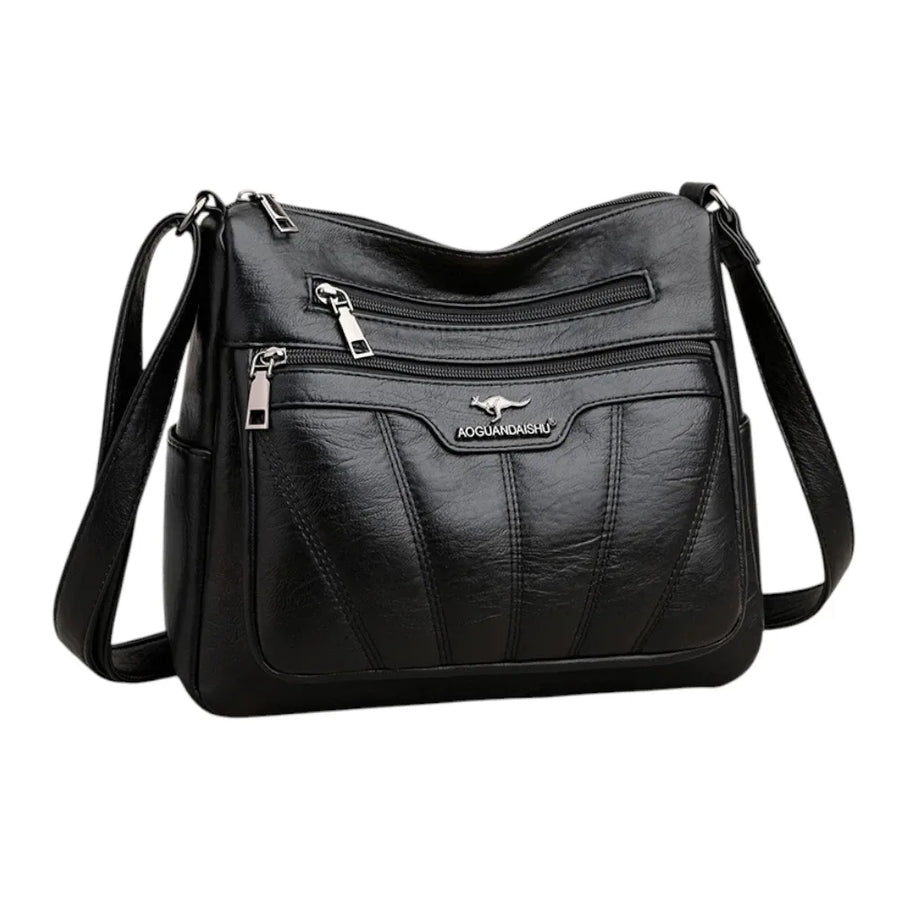 Sac bandoulière femme en cuir souple noir de trois quart