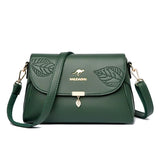 Sac bandoulière femme cuir vert motif feuille