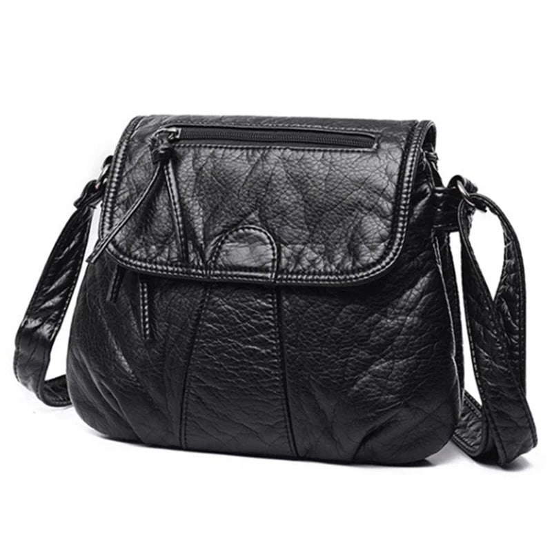 Sac bandoulière femme en similicuir noir