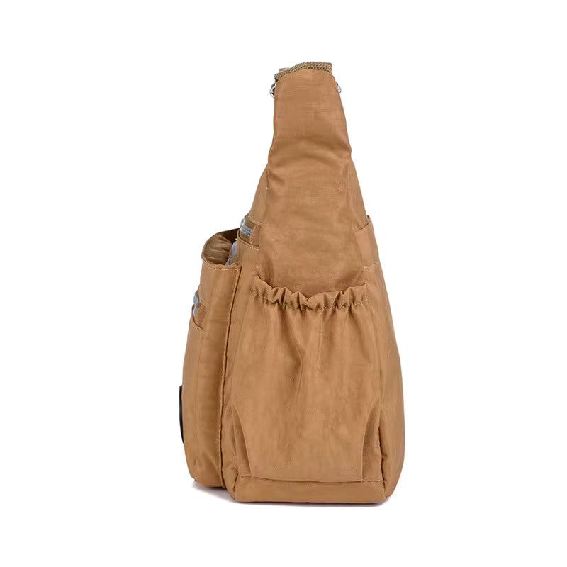 Sac bandoulière femme en tissu marron clair, vue de côté