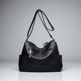 Sac bandoulière noir femme avec surpiqûres arrière